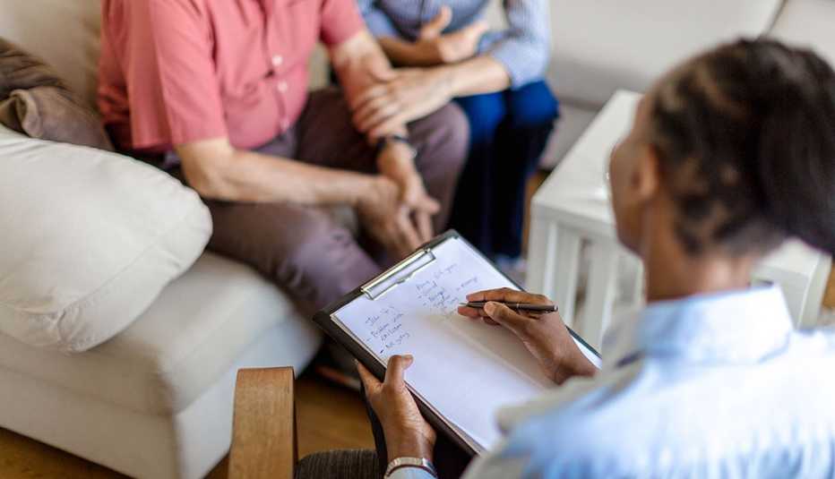 provider interviews patient and spouse