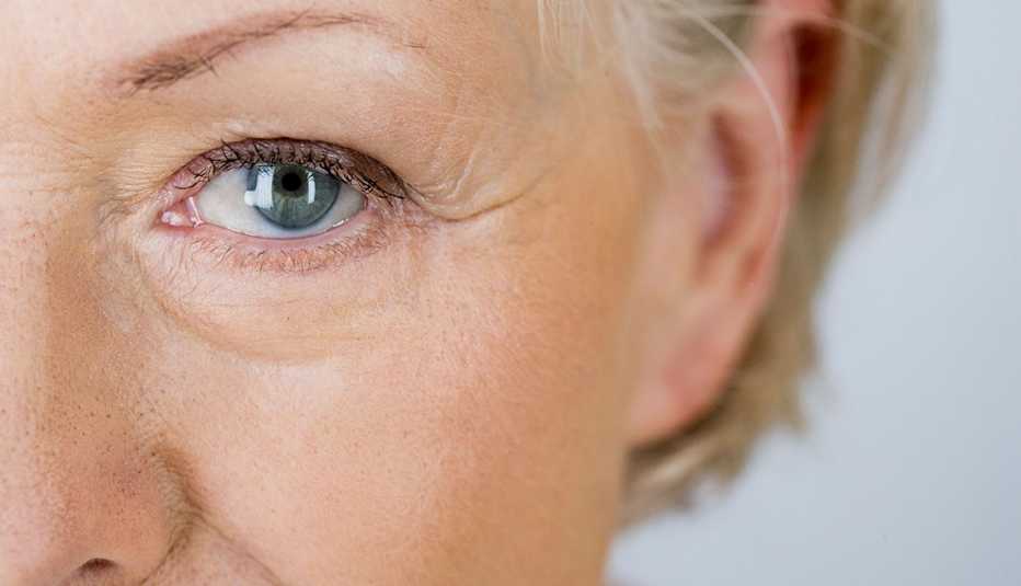 A portrait of an attractive senior woman, close-up of eye