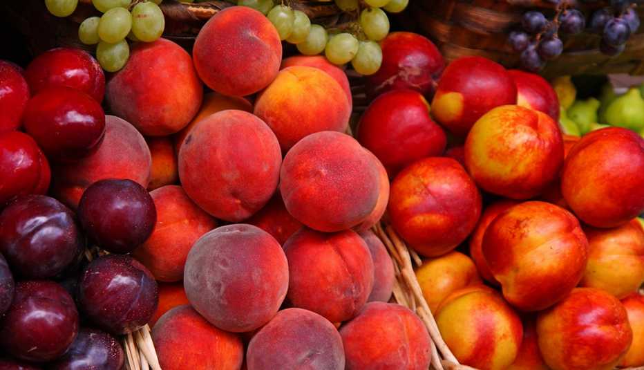 fruit bunched together at the store fruit bunched together at the store