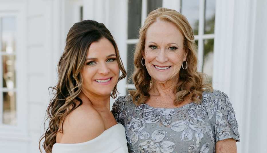 Norine Kirby with her daughter at her daughters wedding norine kirby and her daughter pose of a photo