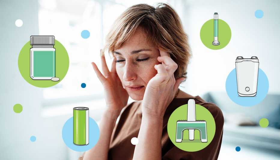 A woman with her eyes closed and hands on her temples as if she's having a migraine