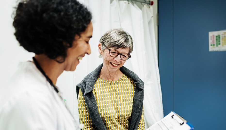 A woman talks with her doctor