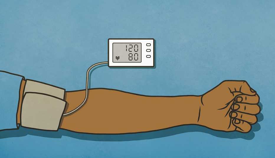 a man's arm with a blood pressure cuff and reading display