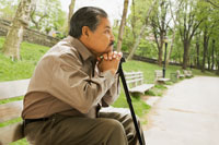Hispanic man with cane on bench-Hip fractures and death Hispanic man with cane on bench-Hip fractures and death