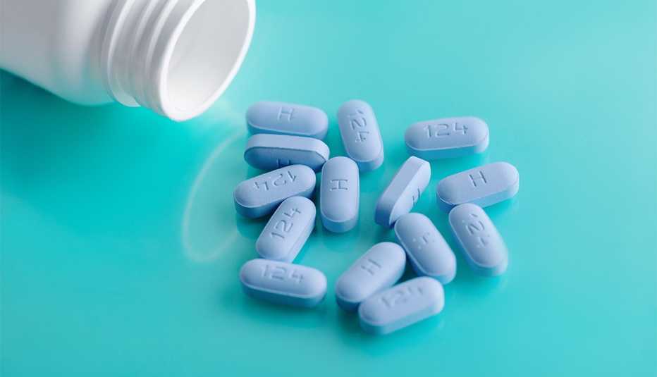 Open bottle of prescription PrEP Pills for Pre-Exposure Prophylaxis to help protect people from HIV.