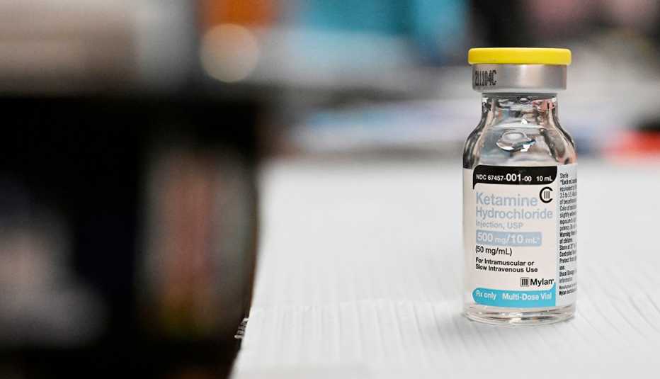 close up of a bottle of therapeutic ketamine for ketamine infusions to treat depression and anxiety on a physician's desk