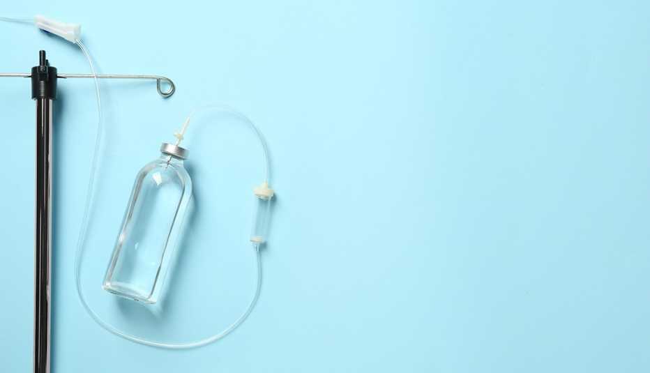 IV infusion for ketamine therapy set on light blue background