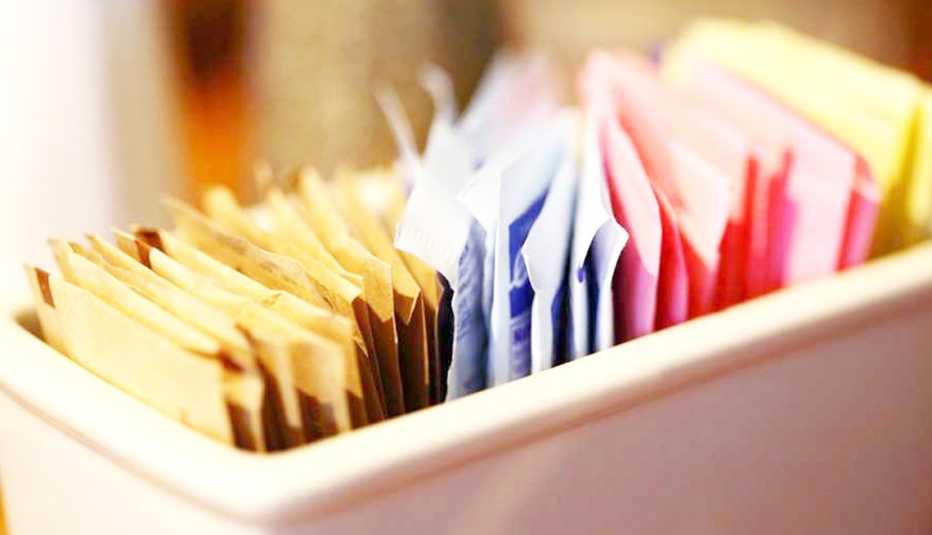 closeup of ubiquitous restaurant table dish of artificial sweeteners
