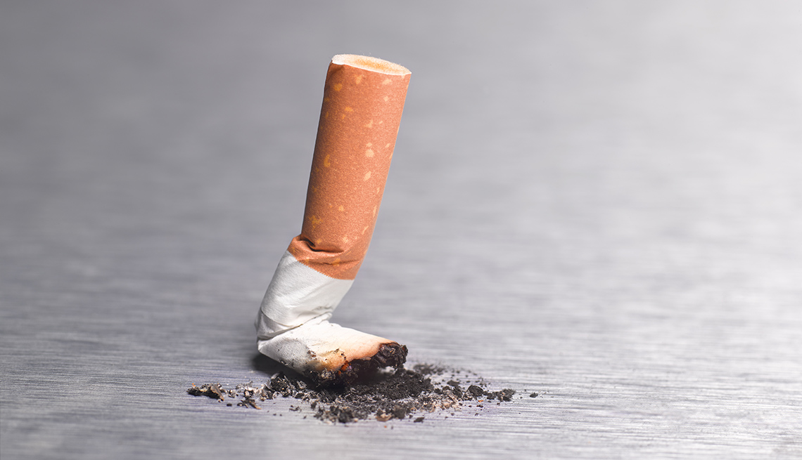 Final cigarette stubbed out, end of smoking