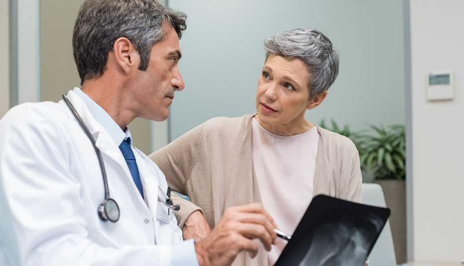 Female patient with doctor