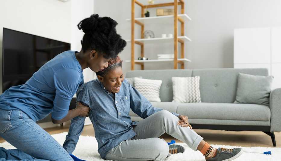 woman helping her mother who has fallen down