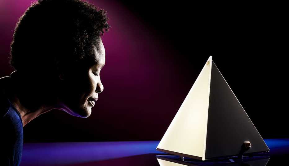 A woman undergoing light-box therapy