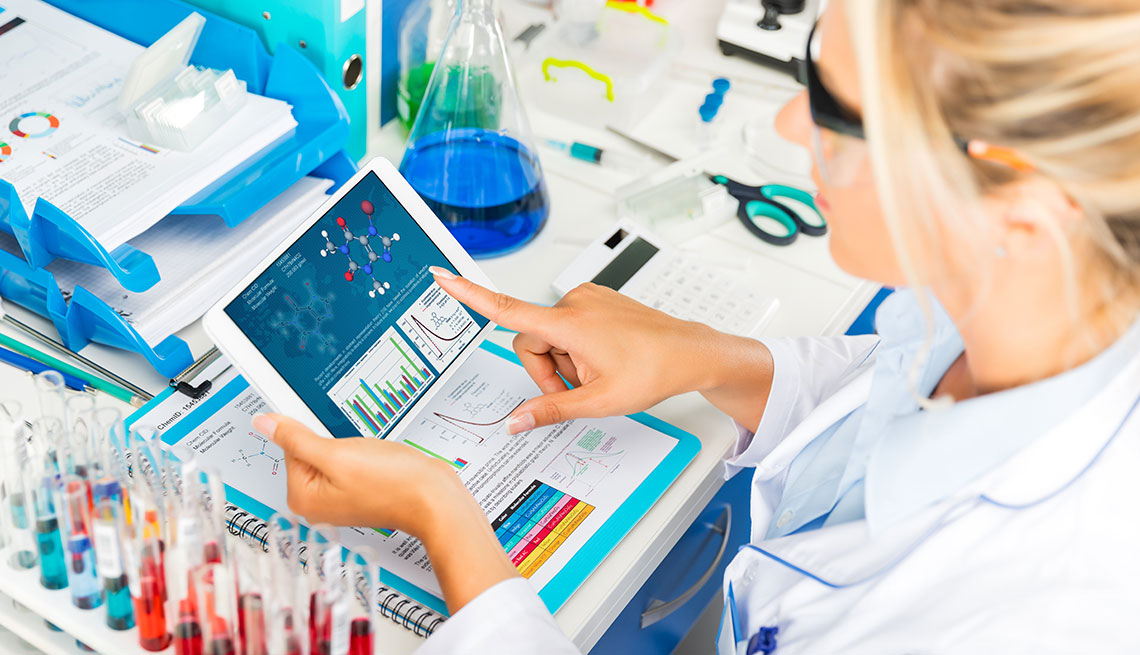 Female scientist using tablet computer in the laboratory