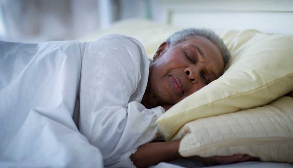 woman sleeping in bed