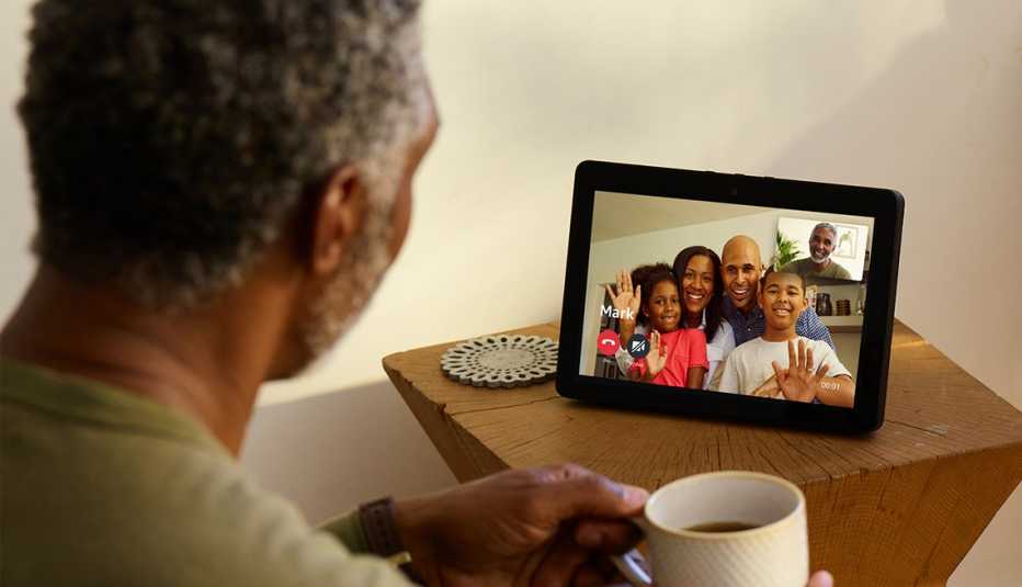 Man talking to his family using Amazon Echo