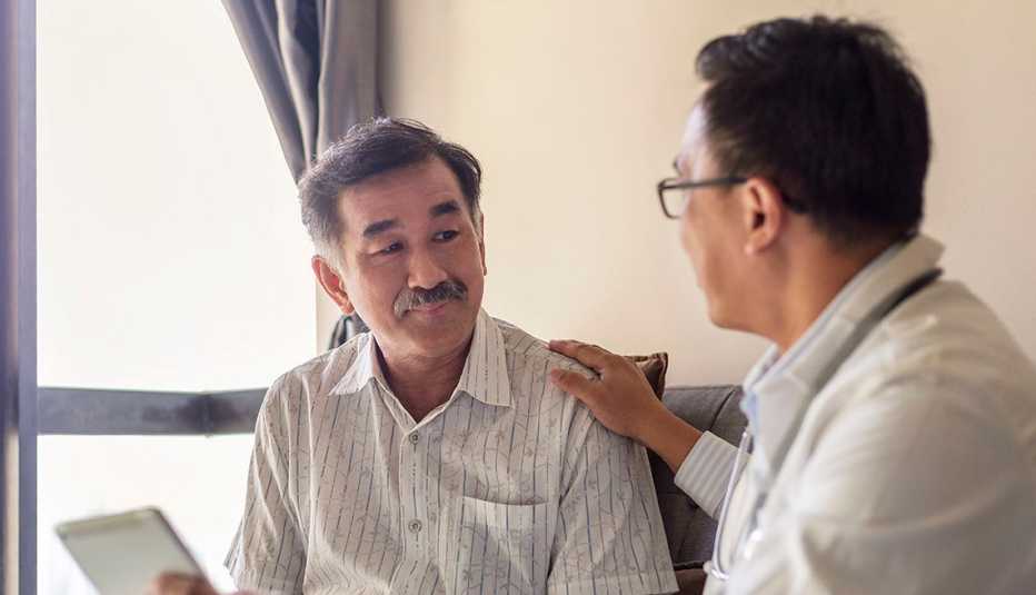 doctor consoling patient