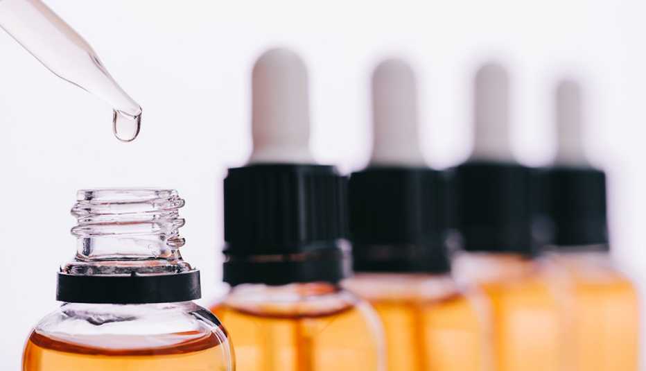 Cannabidiol bottles lined in a row