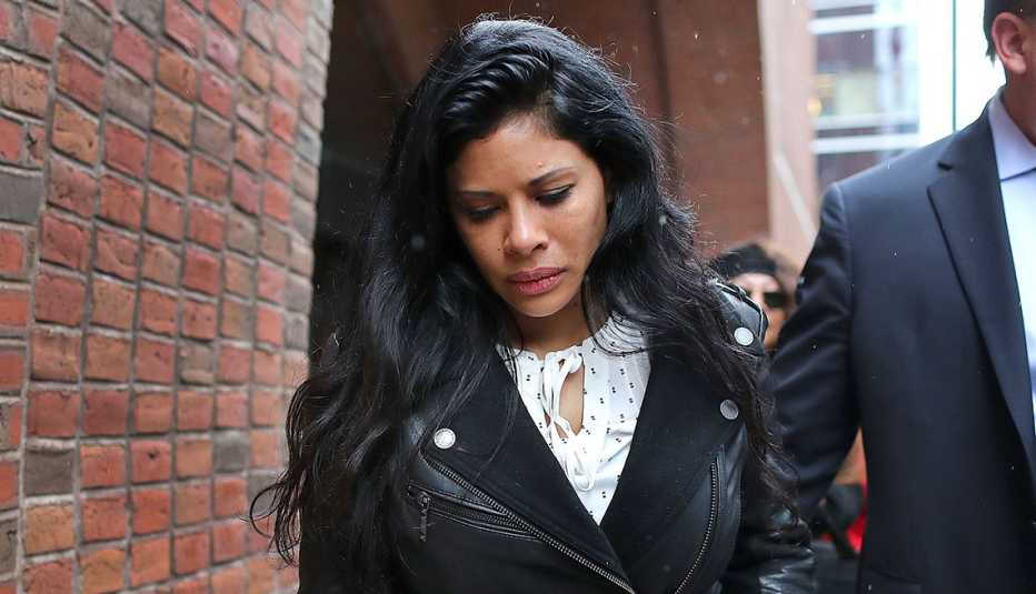 Sunrise Lee leaving a Boston courthouse