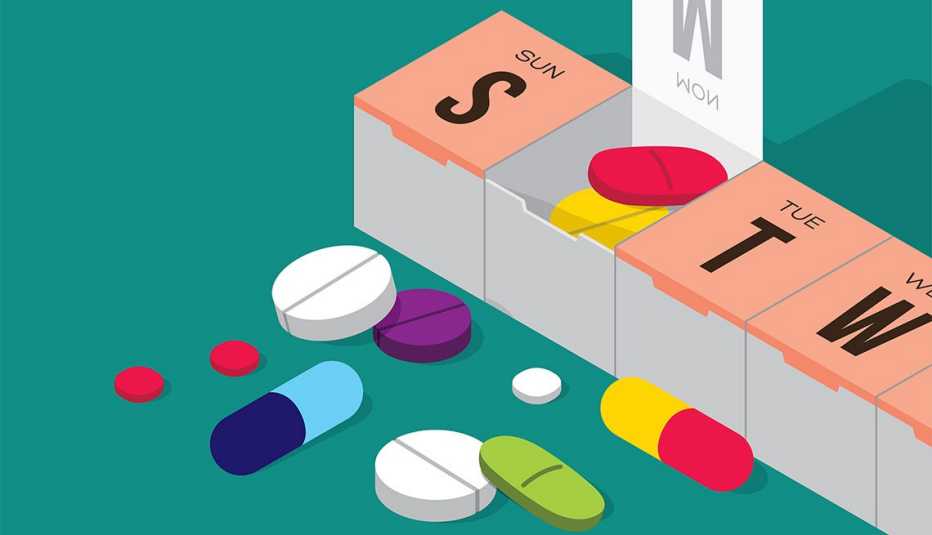 pill organizer with pills spilling out
