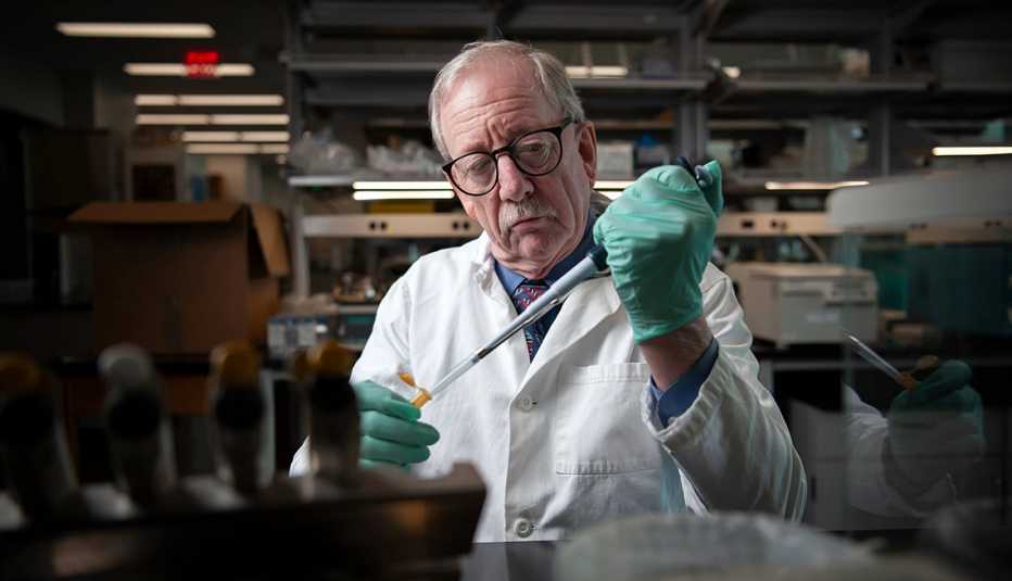 a doctor works with lab equipment a doctor works with lab equipment