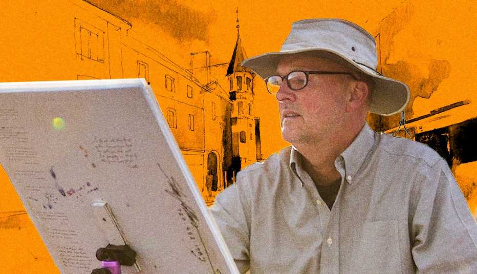 Stan Fellows painting at an easel with an orange background showing a watercolor illustration of a building