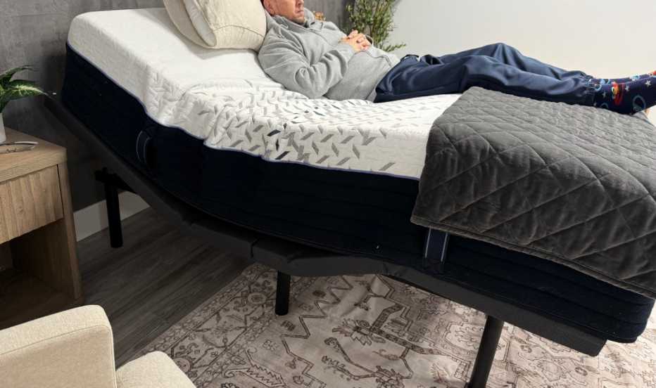 A man on an adjustable base in the zero gravity position.