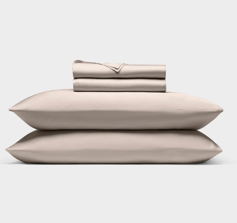 A stack of the Cozy Earth Bamboo Sheet Set with pillows
