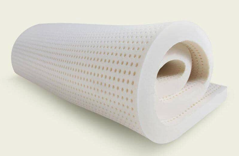 The PlushBeds Organic Latex Mattress Topper rolled up