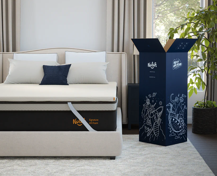The Nolah Mattress Topper on a bed in a bedroom