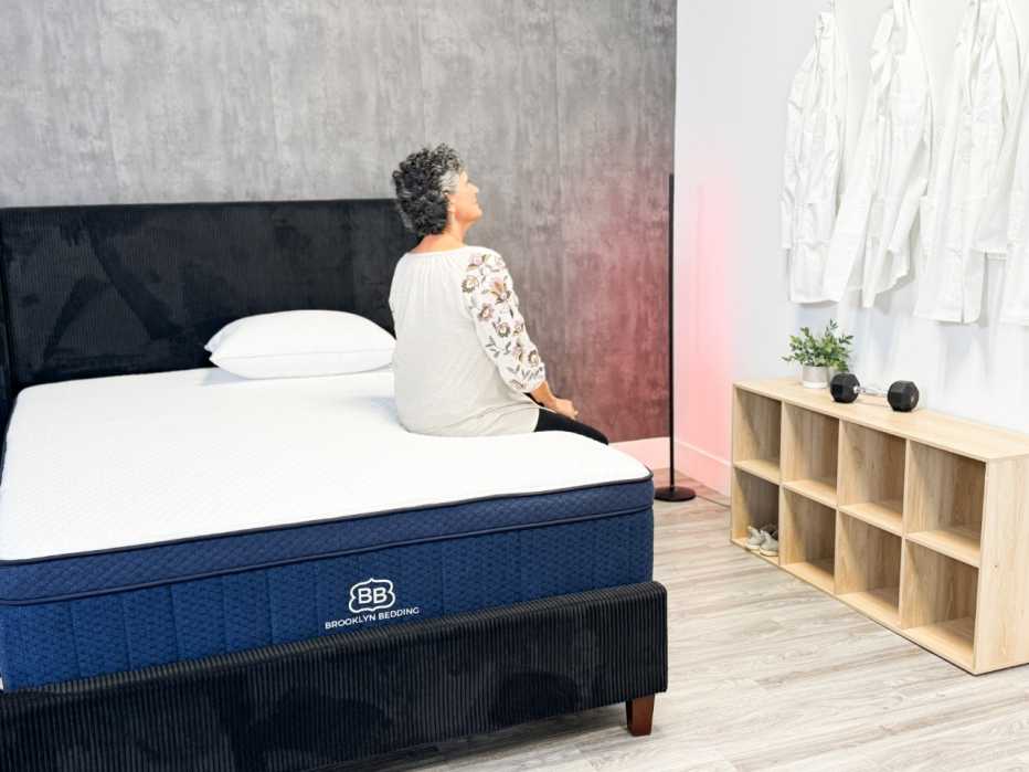 a person sitting on a mattress