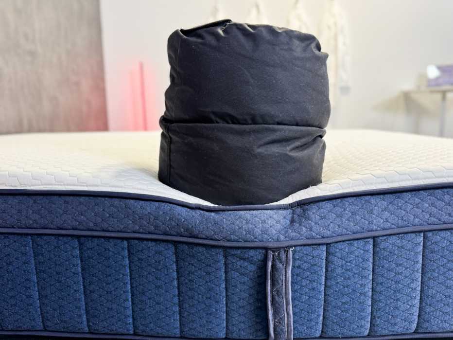 a weight on a mattress during a test