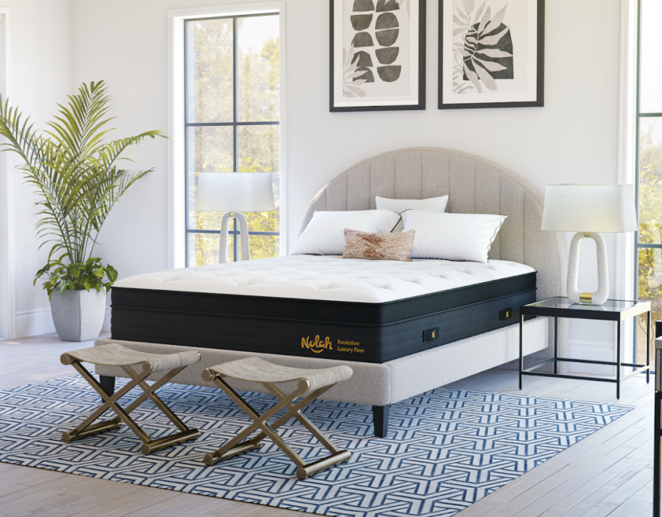 The Nolah Evolution mattress in a white bedroom
