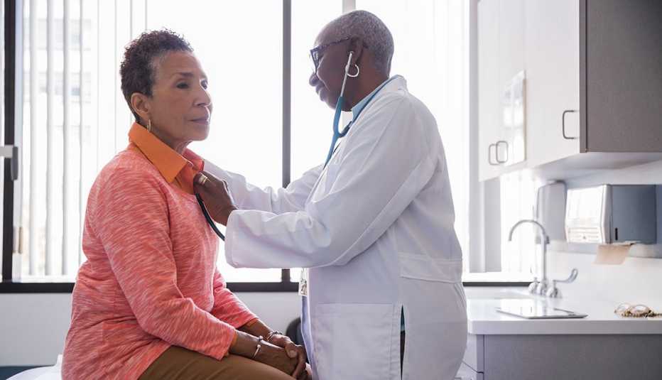 a woman being examined by her doctor