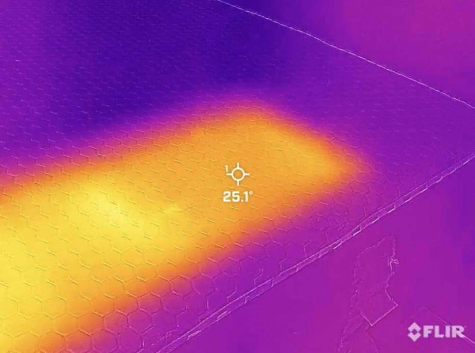 Infrared image of heat on a Brooklyn Bedding bed, showing the temperature in Celsius (25.1 degrees)
