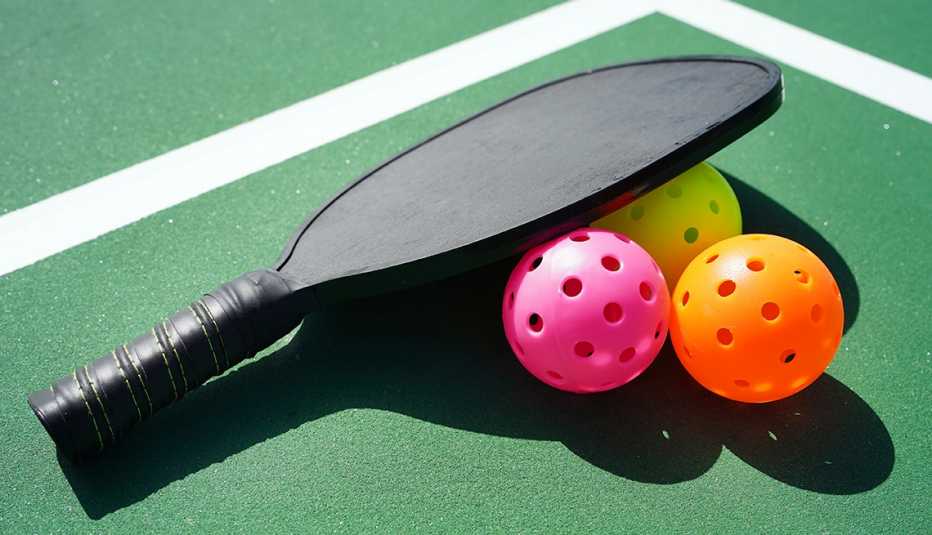pickleball paddle and balls