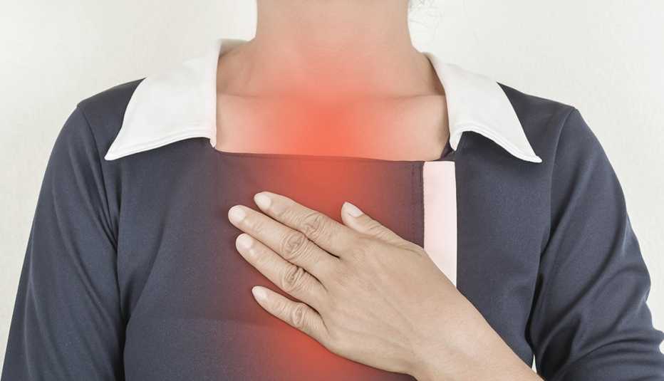 A woman with painful heartburn
