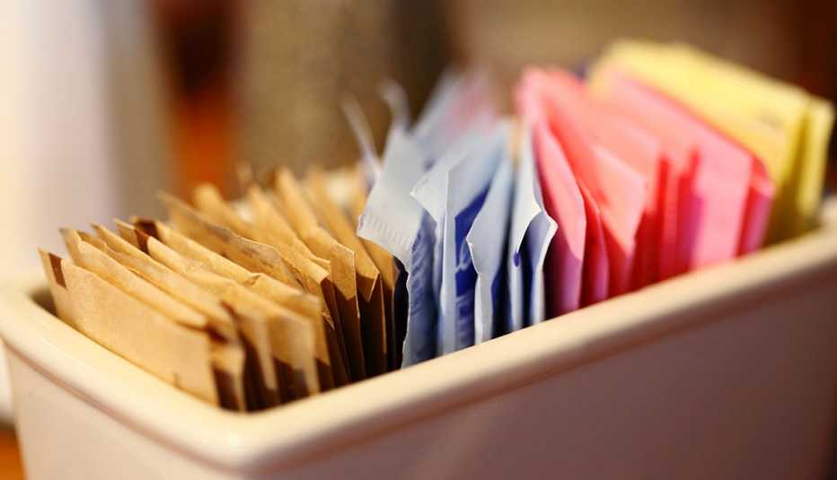 close up of sugar and sweetener packets