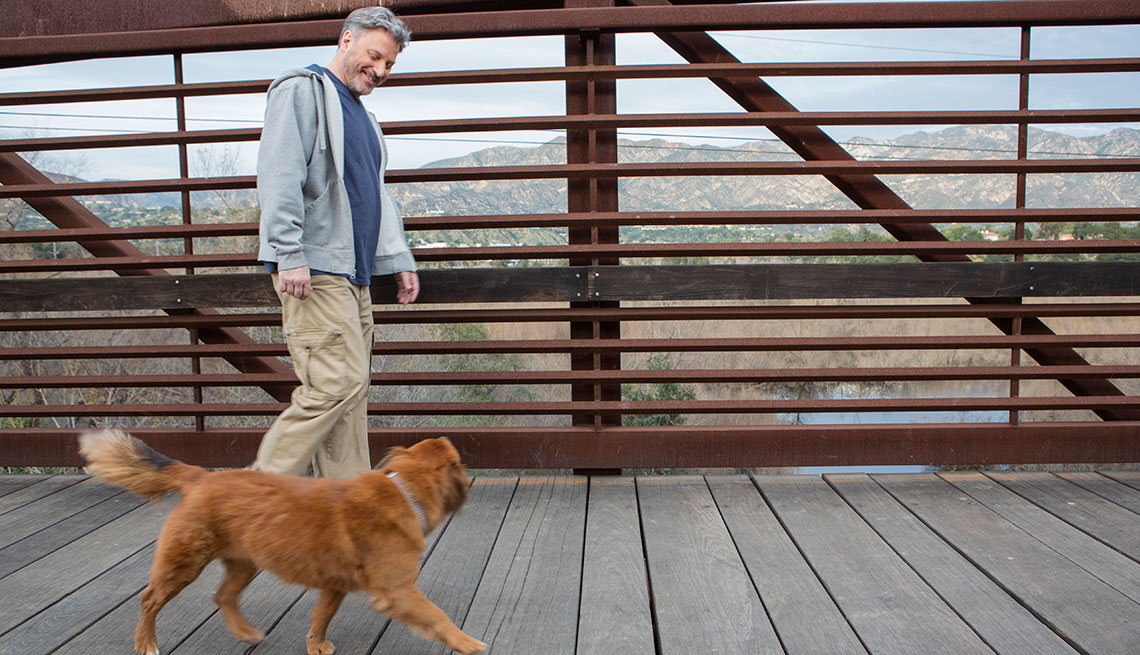 man walking his dog