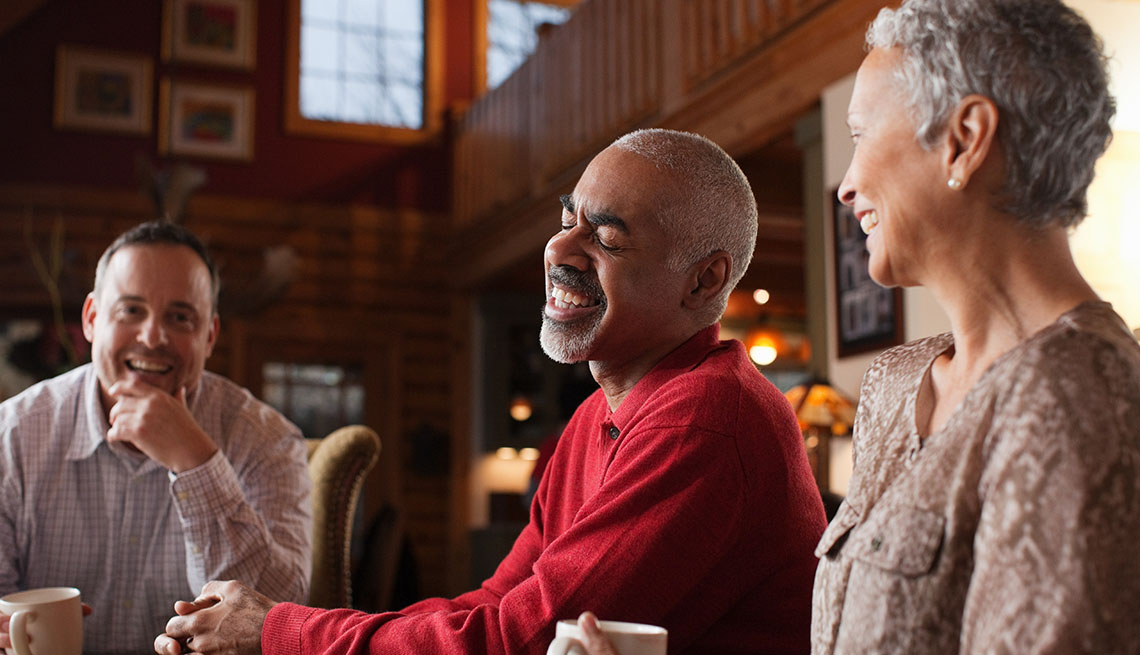 Friends enjoying coffee in a festive setting
