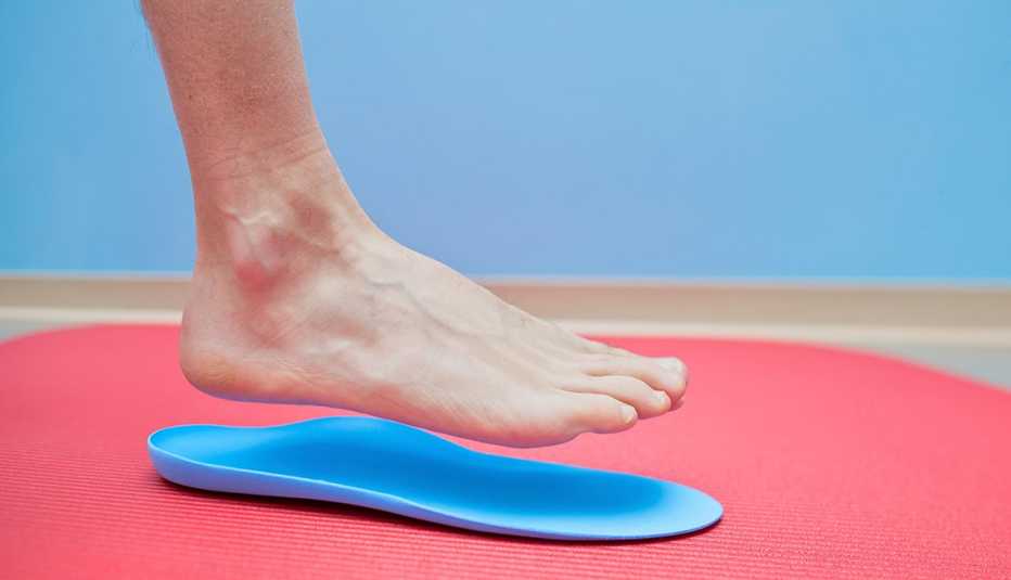 Foot on orthopedic insole. Foot on orthopedic insole.