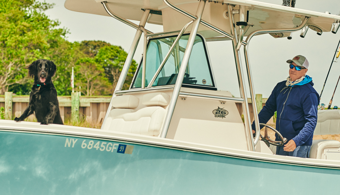 tom colicchio from top chef fishing with his dog tiki off long island new york