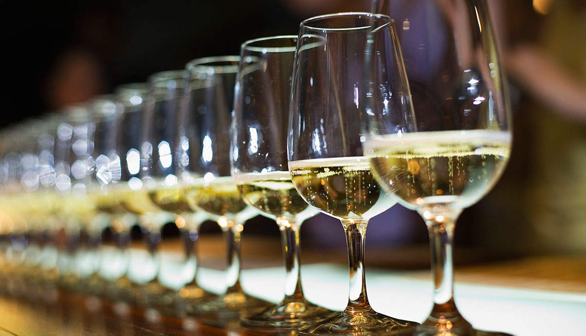 glasses of wine on bar counter 