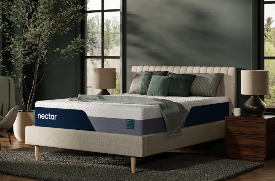 The Nectar Premier Memory Foam mattress in a green bedroom.