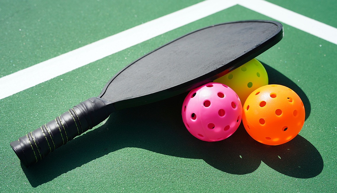 pickleball paddle and balls