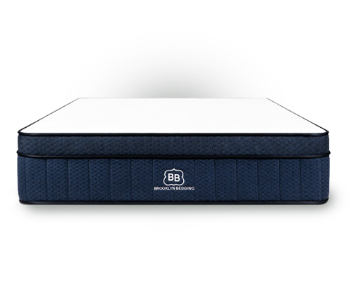 The Brooklyn Bedding Aurora Luxe mattress in a bedroom