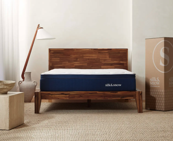 The Silk & Snow Hybrid mattress in a bedroom