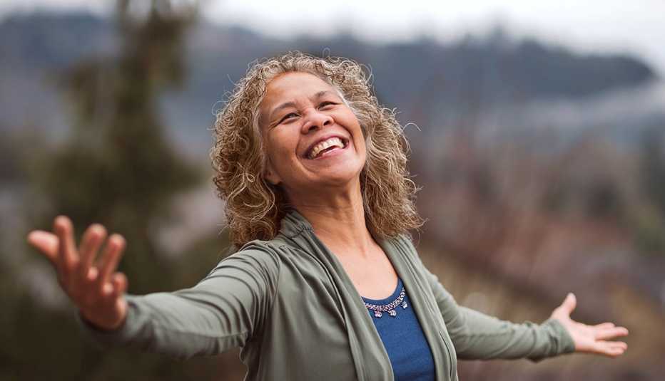 mature woman joyous to be outside 