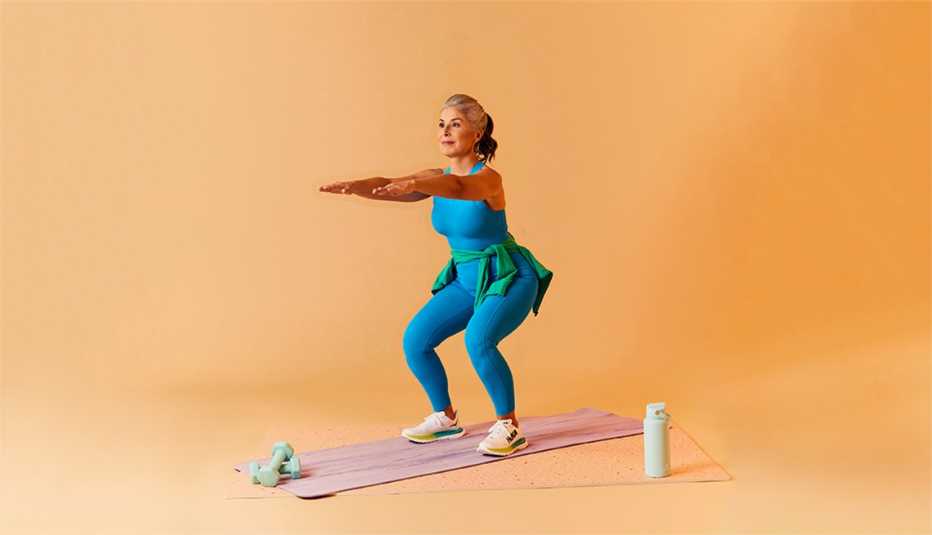 a woman performing a squat exercise