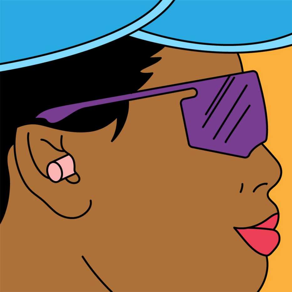 a woman wearing ear plugs and sun glasses