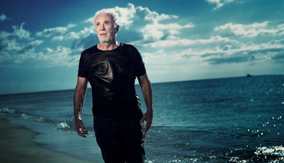 Qemal Agaj on a beach
